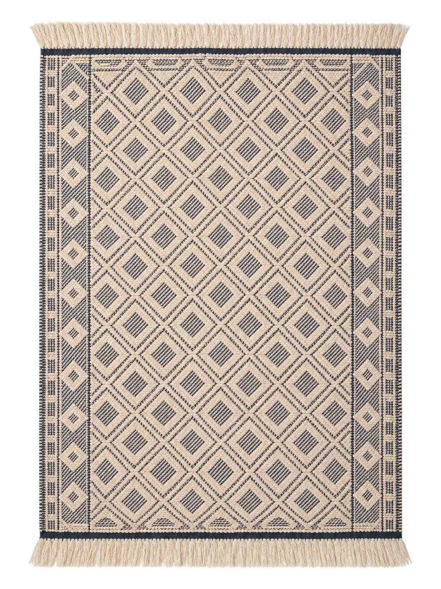 Dark blue and off-white kilim with a raised diamond lattice and fringed ends